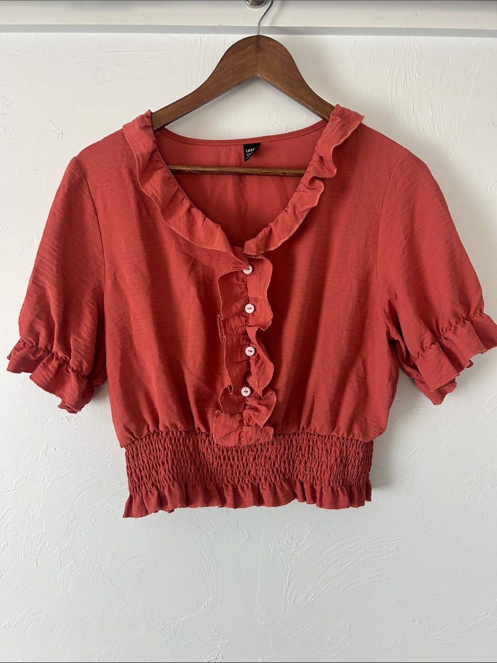 Lioness Coral Ruffle Front Peasant Top